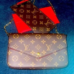 LV Pochette Chain purse (not real but looks just like the real one)